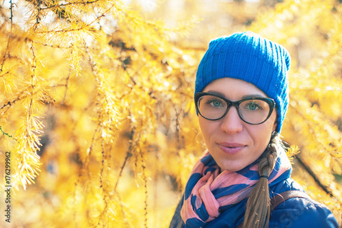 Beauty woman at autumn park...
