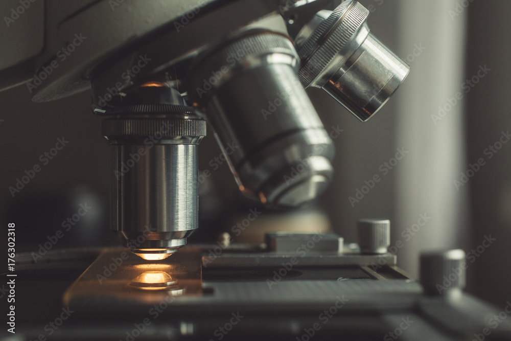 Close-up shot of microscope with metal lens at laboratory. Close-up shot of microscope with metal lens at laboratory.