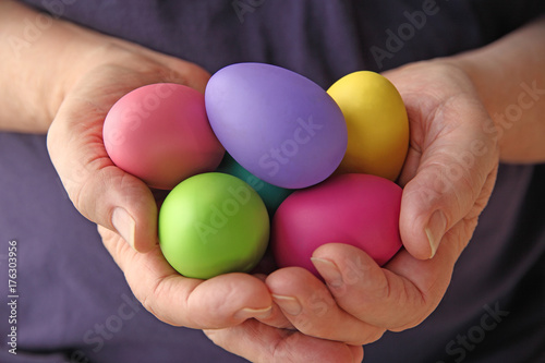 Hands holding Easter eggs