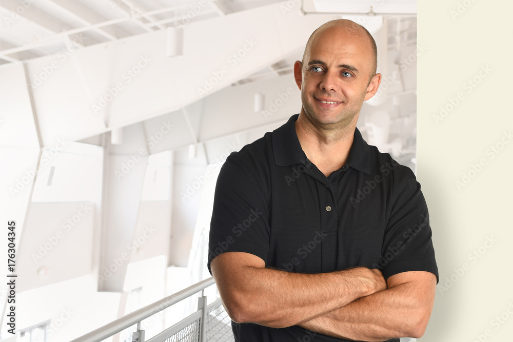 Fototapeta premium Businessman With Arms Crossed Smiling