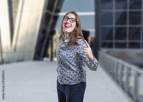 Pretty business woman has a solution with black glasses.