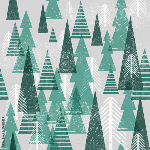 Seamless vector winter forest pattern. Christmas background. Green trees in clouds. Grunge texture graphic simple elements.