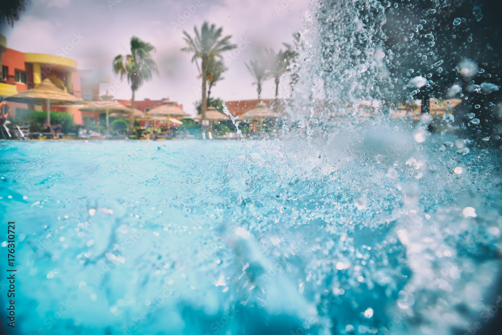 nice view of the swimming pool with waterfall