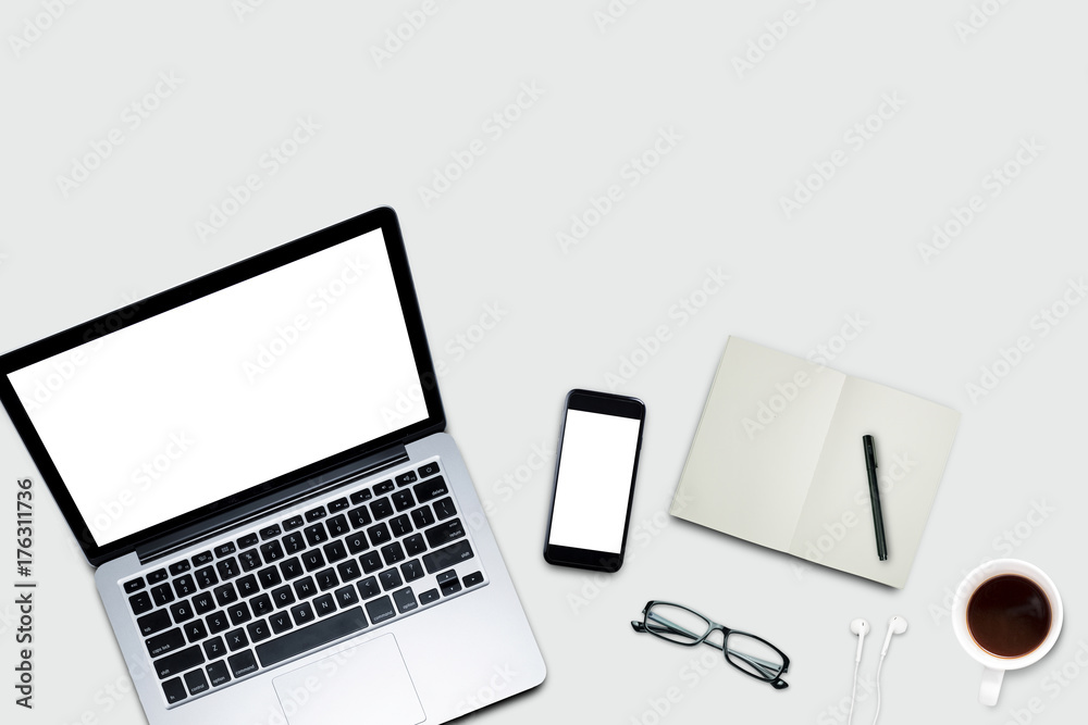 Top view, Working desk, computer, laptop, smart phone, coffee mug, glasses and notebooks on pastel color background with copyspace for text. Top view, Working desk, computer, laptop, smart phone, coffee mug, glasses and notebooks on pastel color background with copyspace for text.