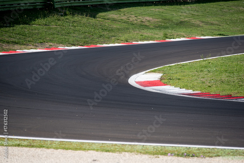 Racing and competiotion concept asphalt circuit track closeup limit borderline concept © fabioderby