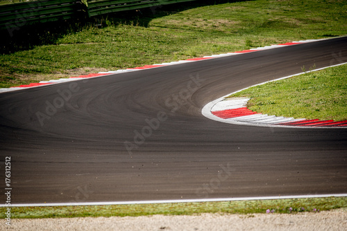 Motorsport racing track curb at round closeup limit borderline concept