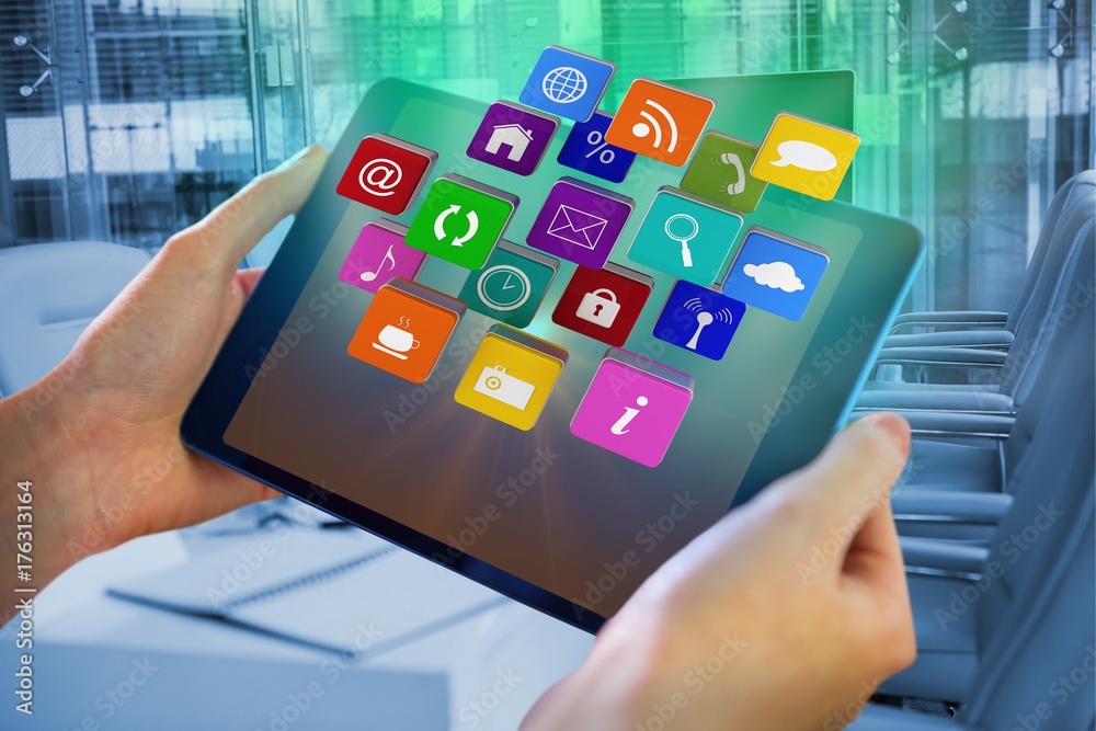 Fotografie Composite image of hands holding tablet