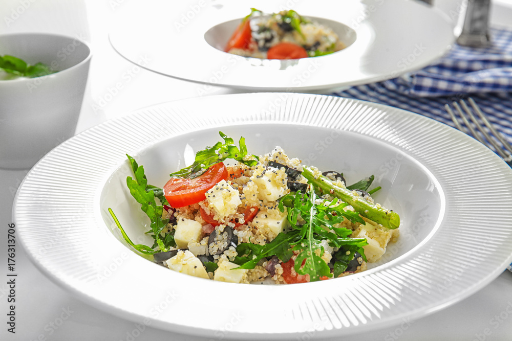Plate with quinoa salad on table, closeup Plate with quinoa salad on table, closeup