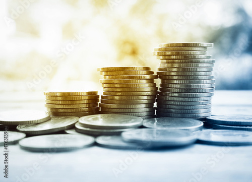 stack of money, rows of coins for finance and banking concept