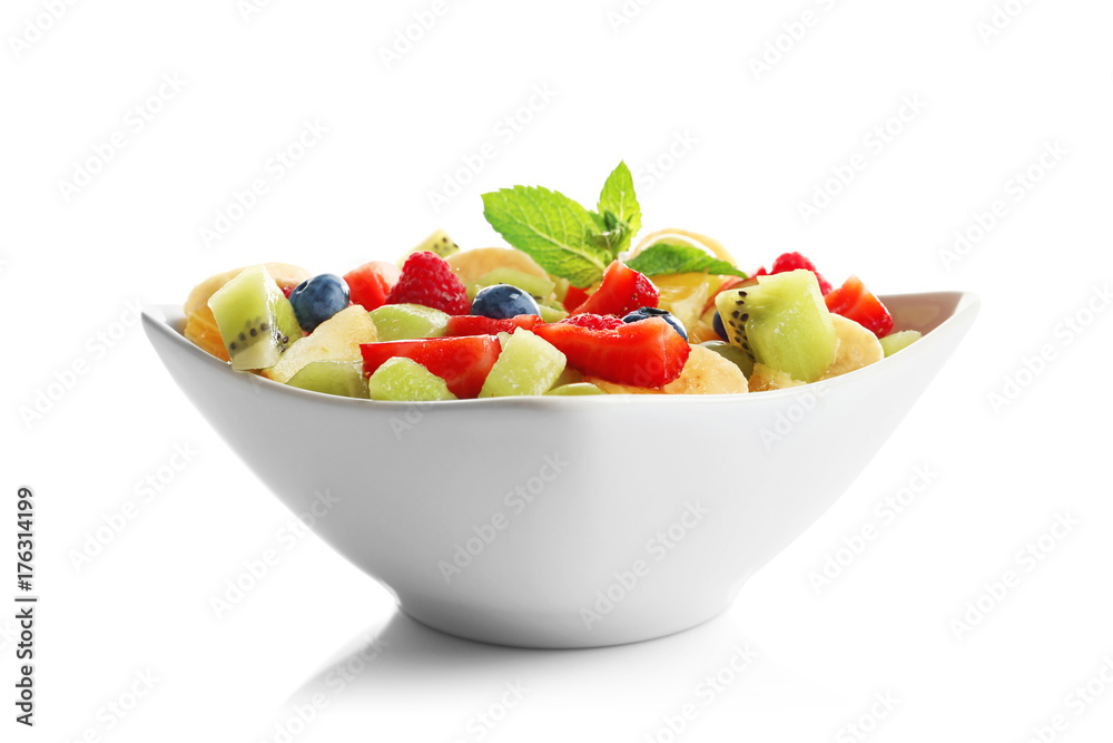 Bowl with yummy fruit salad, isolated on white Bowl with yummy fruit salad, isolated on white