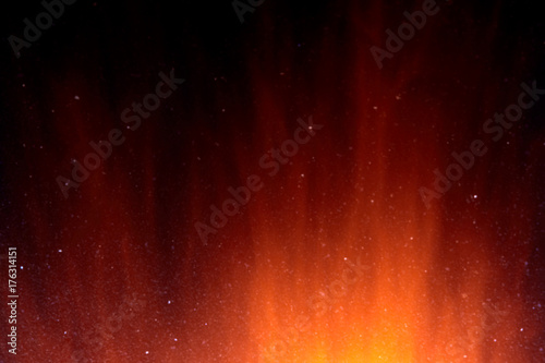 Fire texture on dark background, long exposure.