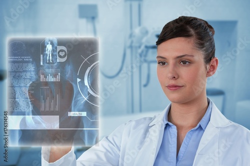 Composite image of beautiful female doctor using imaginative