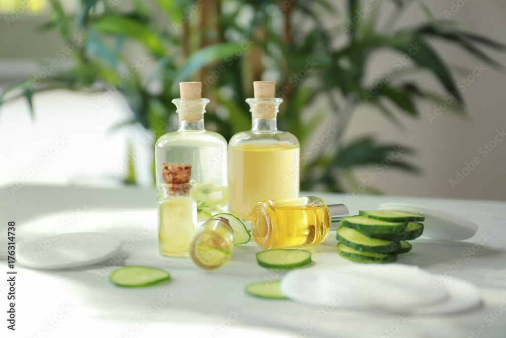 Bottles of cucumber lotion on table Bottles of cucumber lotion on table