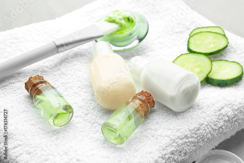 Composition with ingredients for cucumber mask on towel