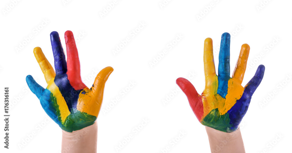 Hands of child in paint against white background Hands of child in paint against white background