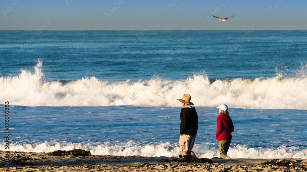 Couple on Beach Walking