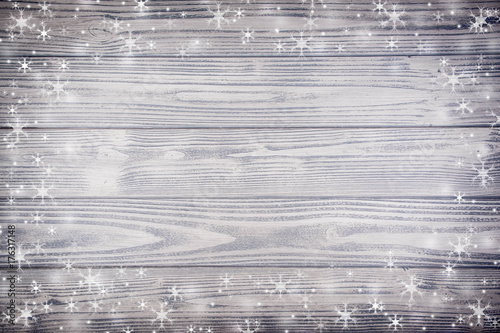 Gray wood texture with snowflakes, christmas background