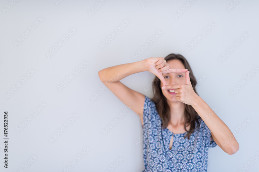 woman showing framing hand gesture woman showing framing hand gesture