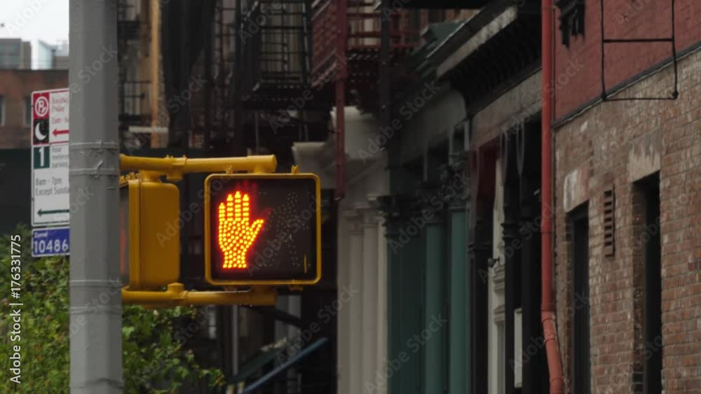 A walk/don't walk sign in Manhattan.  	