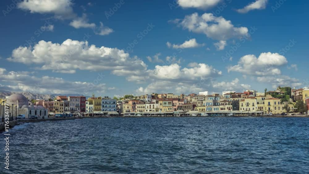 Old port of Chania with clouds on Crete, Greece. Time lapse with clouds, morning light Old port of Chania with clouds on Crete, Greece. Time lapse with clouds, morning light