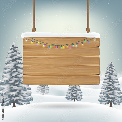 christmas hanging wood board sign on snow