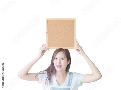 Closeup asian woman with cork board show on above of head isolated on white background with clipping path