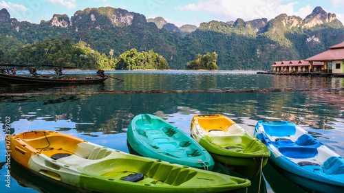 Morning view with Kayaks at Cheow Lan lake ,Khao Sok National Park,SURATTHANI,THAILAND.