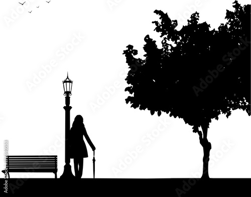 Young sexy girl is standing and waiting for someone with umbrella in park, one in the series of similar images silhouette