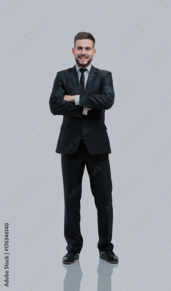 Handsome businessman standing isolated on white background Handsome businessman standing isolated on white background