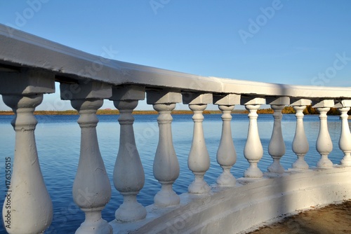 Balustrade in the city park on the lake, observation deck