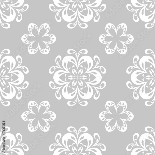 Gray and white floral ornament. Seamless pattern for textile and wallpapers