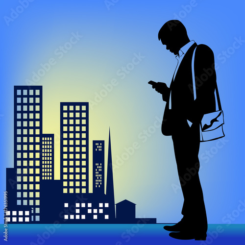 Silhouette of a man in a business suit with a phone in the background of city