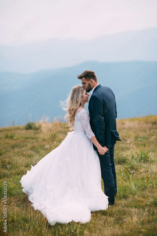 A beautiful couple of brides walking outside