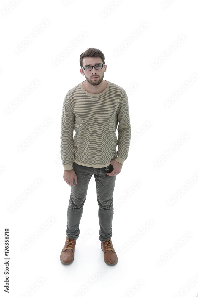 portrait of a serious young man. Photo in full length portrait of a serious young man. Photo in full length
