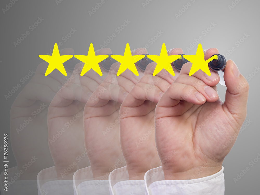 Fototapeta premium Five fading hands with a pen giving a five star review