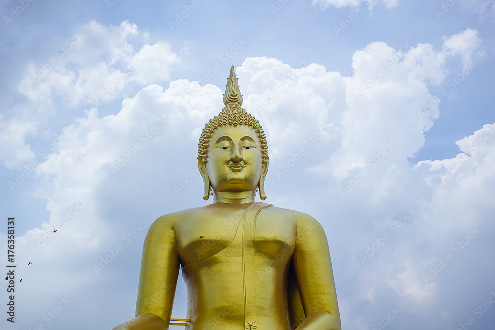 The big golden Buddha statue in Muang temple, Ang Thong, Thailand. The big golden Buddha statue in Muang temple, Ang Thong, Thailand.