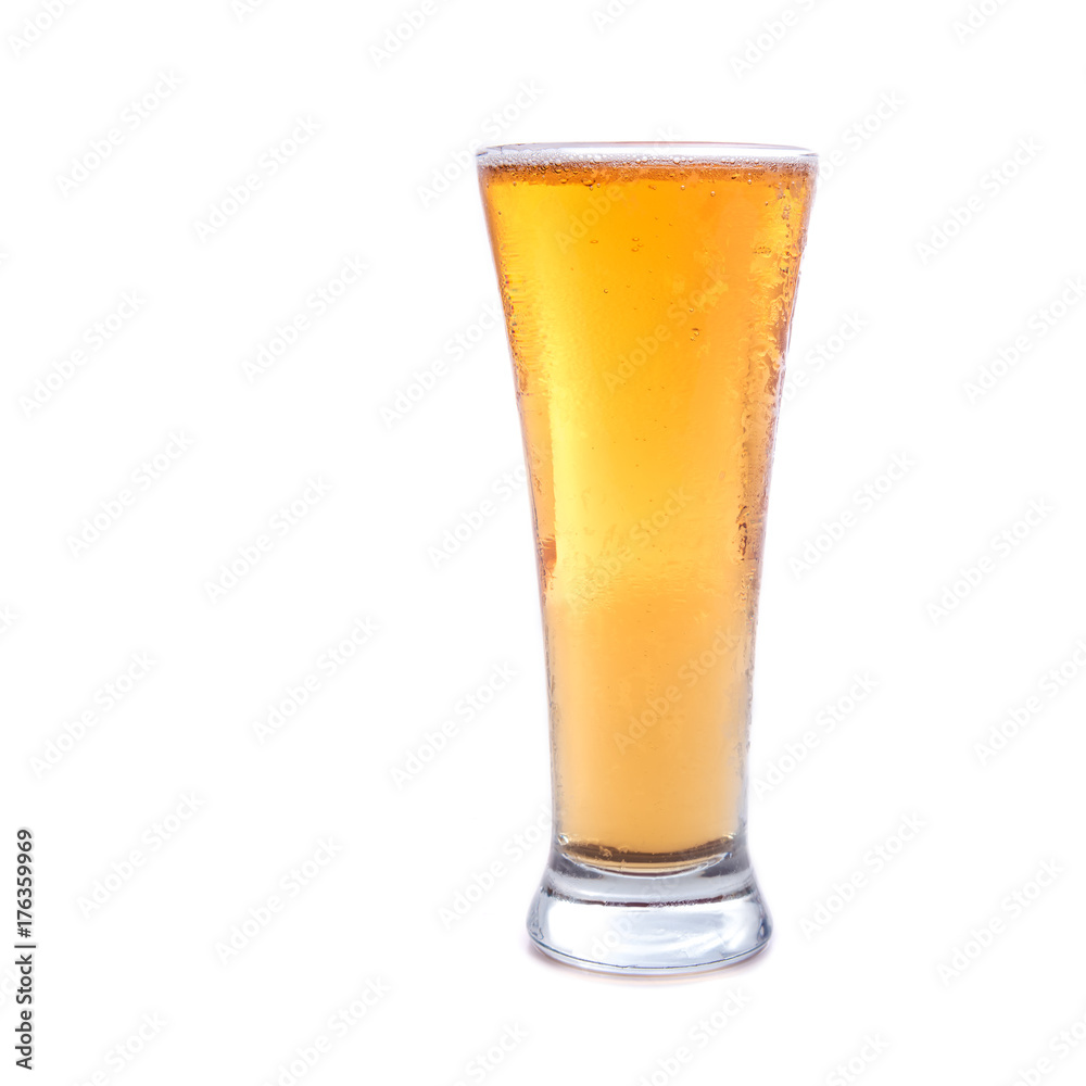 Fresh gold cold and delicious lager beer in glass over white background Fresh gold cold and delicious lager beer in glass over white background