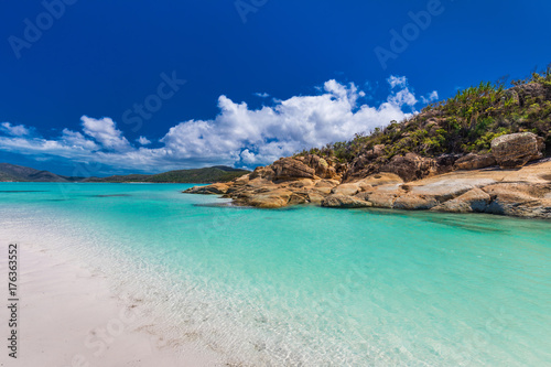 Rocks on Whitehaven Beach with white sand in the Whitsunday Islands, Queensland, Australia