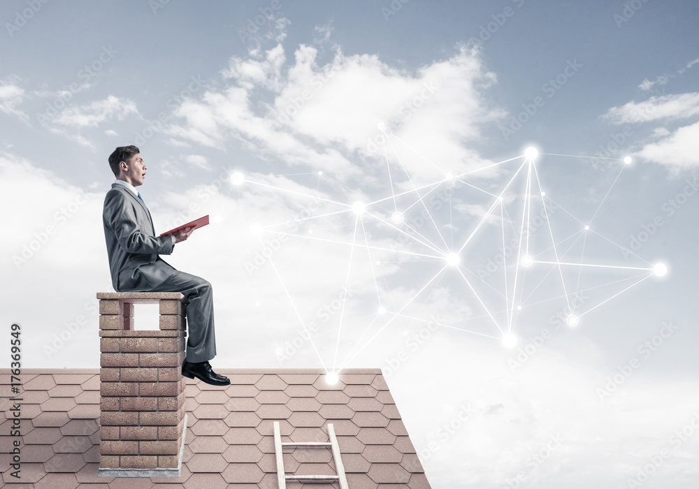 Man reading book and concept of social connection in sky Man reading book and concept of social connection in sky