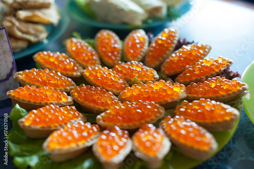 red caviar on white baguette dish closeup 