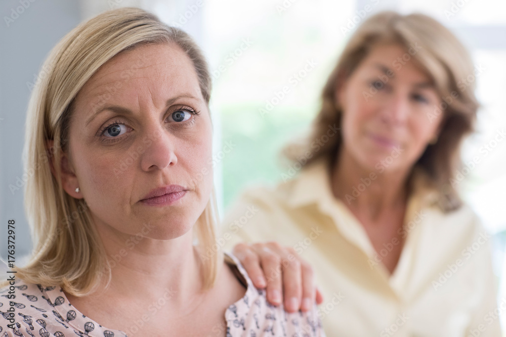 Mature Mother Concerned About Adult Daughter At Home Mature Mother Concerned About Adult Daughter At Home