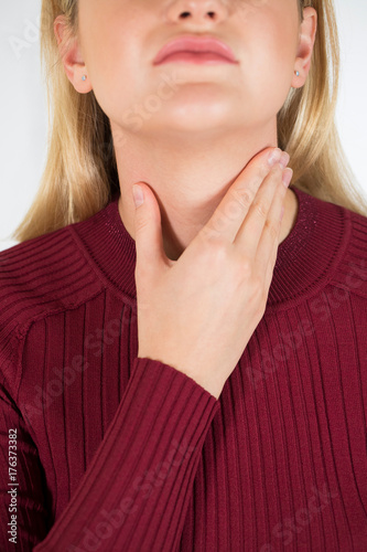 Close Up Of Young Woman Suffering From Sore Throat