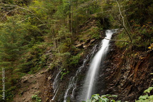 The beautiful waterfall in forest, long exposure in Carpathian mountains