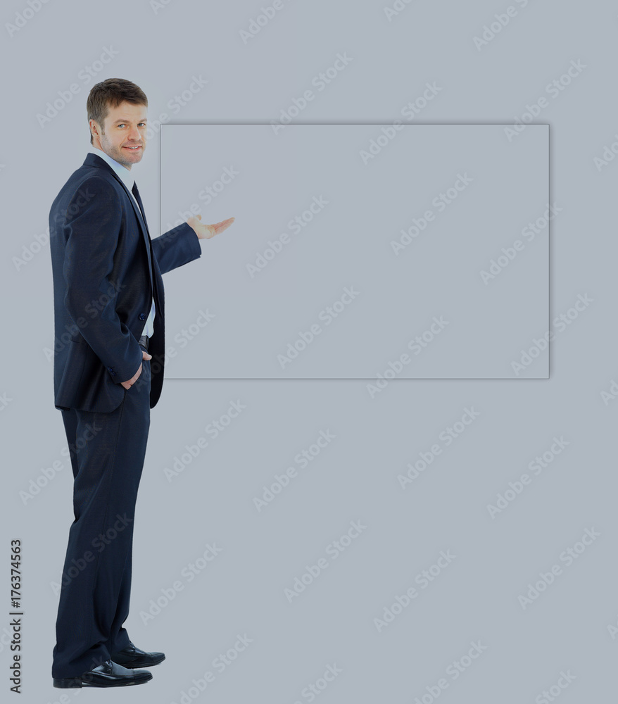 Happy business man presenting and showing with copy space for your text isolated on white background Happy business man presenting and showing with copy space for your text isolated on white background