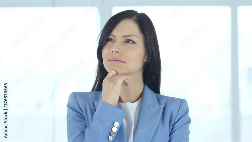 Portrait of Thinking Pensive Young Female Worker Portrait of Thinking Pensive Young Female Worker