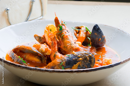 Mussels with shrimp and potatoes photo