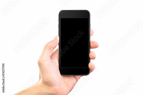 Wallpaper Mural Male hand holding black cellphone isolated at white background. Torontodigital.ca