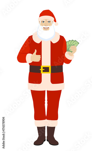 Santa Claus with cash money showing thumb up © komissar007