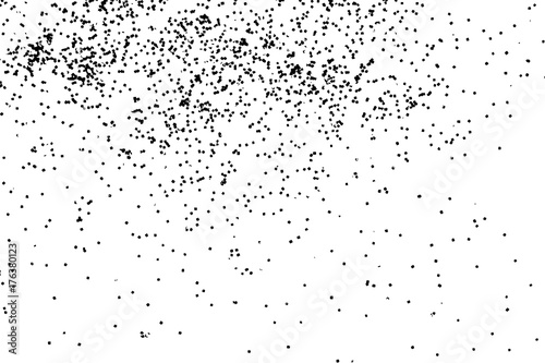 Abstract grainy texture isolated on white background. Top view. Dust, sand blow or bread crumbs. Silhouette of food flakes such as salt or almond or wheat flour spread on the flat surface or table.