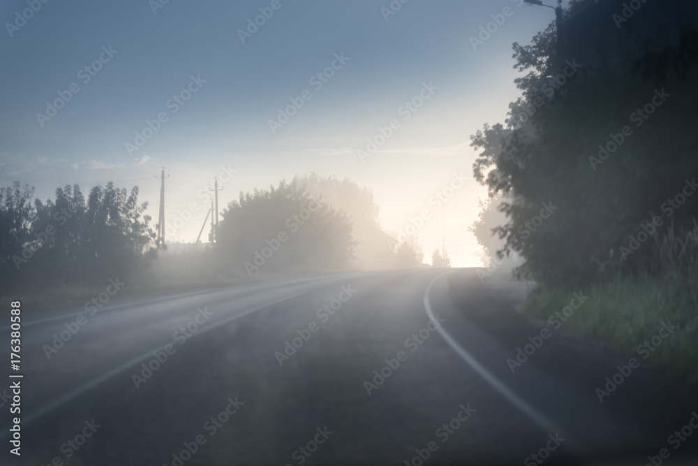 road covered in fog